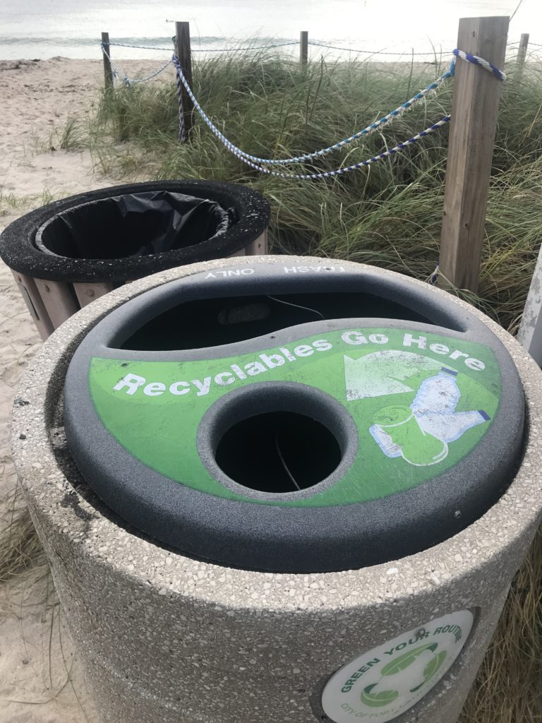 trash and recycle bin at the beach