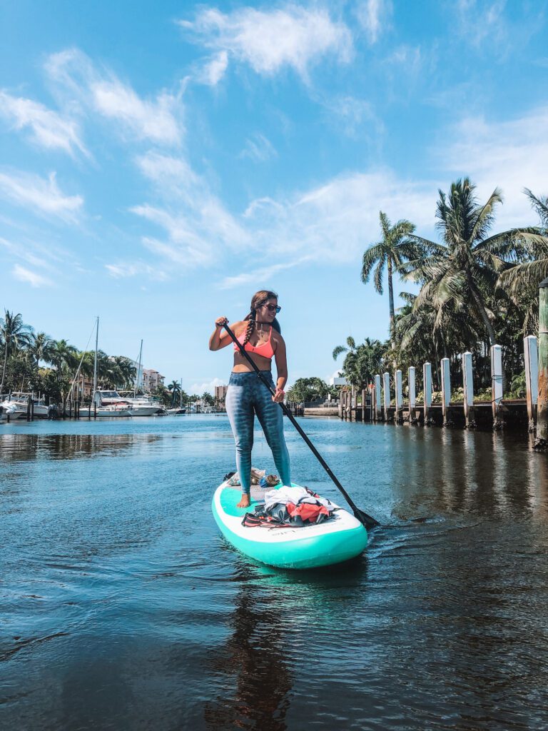 woman paddling canals in fort lauderdale