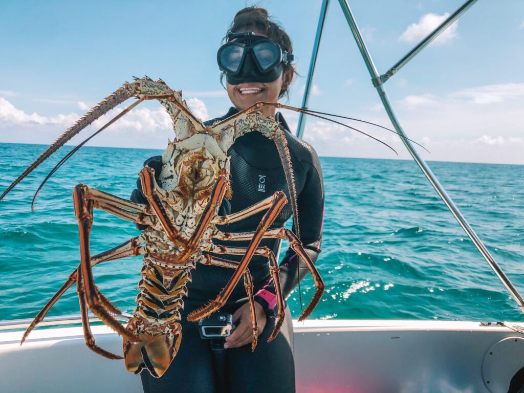 woman with lobster with gopro mount mask