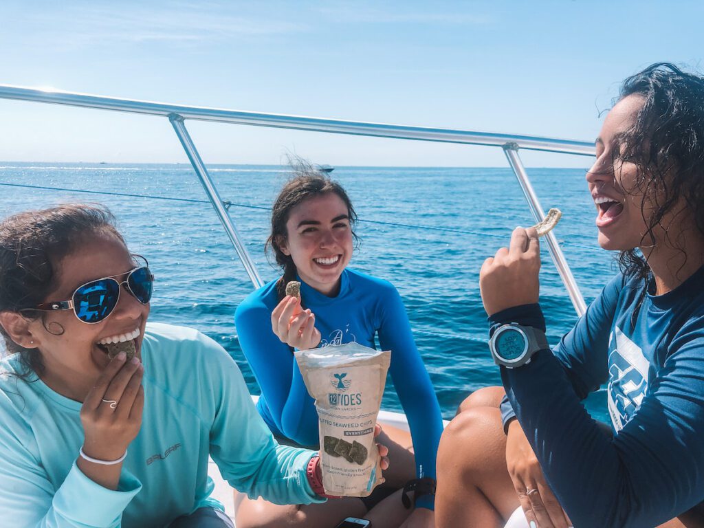 eating eco-friendly snacks on the boat in jupiter