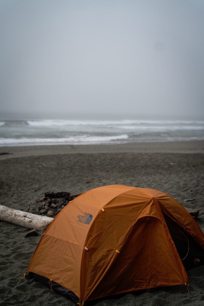 beach camping in the rain