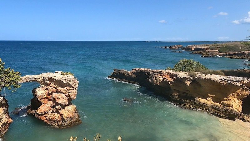 archway and blue waters of cabo rojo national wildlife refuge puerto rico faro los morrillos