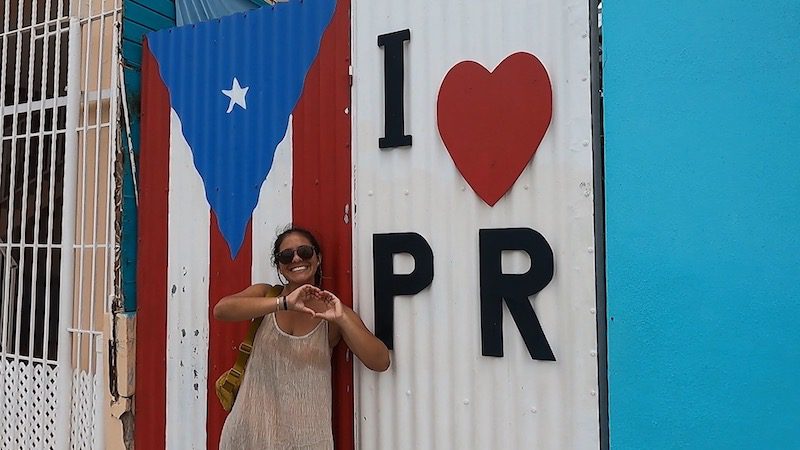 laura next to i love Puerto rico sign in la parguera